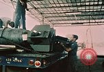 Image of loading bombs on B-52 aircraft in Vietnam War Guam, 1967, second 19 stock footage video 65675051905