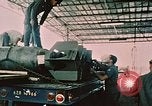 Image of loading bombs on B-52 aircraft in Vietnam War Guam, 1967, second 21 stock footage video 65675051905