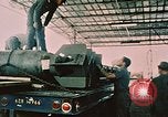 Image of loading bombs on B-52 aircraft in Vietnam War Guam, 1967, second 22 stock footage video 65675051905