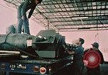 Image of loading bombs on B-52 aircraft in Vietnam War Guam, 1967, second 23 stock footage video 65675051905