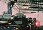 Image of loading bombs on B-52 aircraft in Vietnam War Guam, 1967, second 24 stock footage video 65675051905