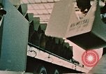 Image of loading bombs on B-52 aircraft in Vietnam War Guam, 1967, second 27 stock footage video 65675051905