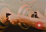 Image of loading bombs on B-52 aircraft in Vietnam War Guam, 1967, second 51 stock footage video 65675051905