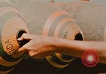 Image of loading bombs on B-52 aircraft in Vietnam War Guam, 1967, second 54 stock footage video 65675051905