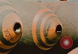 Image of loading bombs on B-52 aircraft in Vietnam War Guam, 1967, second 56 stock footage video 65675051905