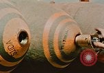 Image of loading bombs on B-52 aircraft in Vietnam War Guam, 1967, second 60 stock footage video 65675051905