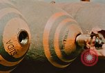 Image of loading bombs on B-52 aircraft in Vietnam War Guam, 1967, second 61 stock footage video 65675051905