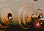 Image of loading bombs on B-52 aircraft in Vietnam War Guam, 1967, second 62 stock footage video 65675051905