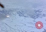 Standbild US-Flugzeuge strafing Korea, 1951, aus Sekunde 28 historischem Filmmaterial Videoclip 65675051936