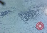 Standbild US-Flugzeuge strafing Korea, 1951, aus Sekunde 31 historischem Filmmaterial Videoclip 65675051936