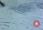 Standbild US-Flugzeuge strafing Korea, 1951, aus Sekunde 55 historischem Filmmaterial Videoclip 65675051936