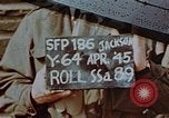 Image of vehicles on road Germany, 1945, second 1 stock footage video 65675051958