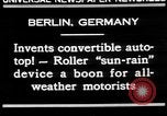 Image of man driving car Berlin Germany, 1930, second 6 stock footage video 65675052012