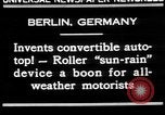 Image of man driving car Berlin Germany, 1930, second 7 stock footage video 65675052012