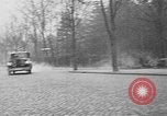 Image of man driving car Berlin Germany, 1930, second 10 stock footage video 65675052012