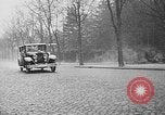 Image of man driving car Berlin Germany, 1930, second 11 stock footage video 65675052012
