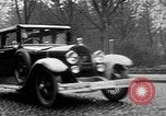Image of man driving car Berlin Germany, 1930, second 13 stock footage video 65675052012