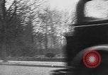 Image of man driving car Berlin Germany, 1930, second 14 stock footage video 65675052012