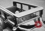 Image of man driving car Berlin Germany, 1930, second 15 stock footage video 65675052012