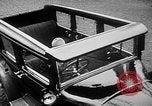 Image of man driving car Berlin Germany, 1930, second 16 stock footage video 65675052012