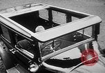 Image of man driving car Berlin Germany, 1930, second 17 stock footage video 65675052012