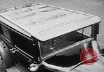 Image of man driving car Berlin Germany, 1930, second 19 stock footage video 65675052012