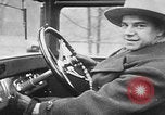 Image of man driving car Berlin Germany, 1930, second 23 stock footage video 65675052012
