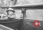 Image of man driving car Berlin Germany, 1930, second 28 stock footage video 65675052012