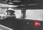 Image of man driving car Berlin Germany, 1930, second 30 stock footage video 65675052012