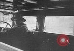 Image of man driving car Berlin Germany, 1930, second 31 stock footage video 65675052012