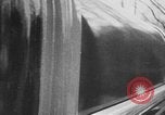 Image of man driving car Berlin Germany, 1930, second 32 stock footage video 65675052012