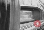 Image of man driving car Berlin Germany, 1930, second 33 stock footage video 65675052012
