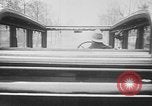 Image of man driving car Berlin Germany, 1930, second 34 stock footage video 65675052012
