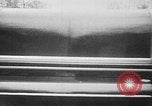 Image of man driving car Berlin Germany, 1930, second 36 stock footage video 65675052012