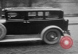 Image of man driving car Berlin Germany, 1930, second 37 stock footage video 65675052012