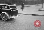 Image of man driving car Berlin Germany, 1930, second 38 stock footage video 65675052012