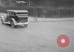 Image of man driving car Berlin Germany, 1930, second 39 stock footage video 65675052012