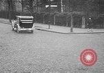 Image of man driving car Berlin Germany, 1930, second 40 stock footage video 65675052012