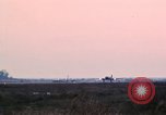 Image of crewmen Vietnam Bien Hoa Air Base, 1967, second 6 stock footage video 65675052030