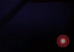 Image of descending parachute flares Vietnam Bien Hoa Air Base, 1967, second 9 stock footage video 65675052031