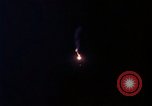 Image of descending parachute flares Vietnam Bien Hoa Air Base, 1967, second 15 stock footage video 65675052031