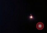 Image of descending parachute flares Vietnam Bien Hoa Air Base, 1967, second 21 stock footage video 65675052031