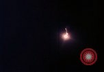 Image of descending parachute flares Vietnam Bien Hoa Air Base, 1967, second 23 stock footage video 65675052031