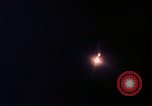 Image of descending parachute flares Vietnam Bien Hoa Air Base, 1967, second 26 stock footage video 65675052031