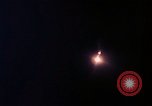 Image of descending parachute flares Vietnam Bien Hoa Air Base, 1967, second 27 stock footage video 65675052031