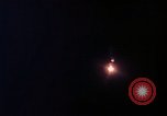 Image of descending parachute flares Vietnam Bien Hoa Air Base, 1967, second 28 stock footage video 65675052031