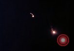 Image of descending parachute flares Vietnam Bien Hoa Air Base, 1967, second 32 stock footage video 65675052031