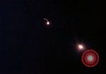 Image of descending parachute flares Vietnam Bien Hoa Air Base, 1967, second 33 stock footage video 65675052031