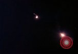 Image of descending parachute flares Vietnam Bien Hoa Air Base, 1967, second 34 stock footage video 65675052031