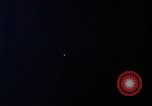 Image of descending parachute flares Vietnam Bien Hoa Air Base, 1967, second 38 stock footage video 65675052031